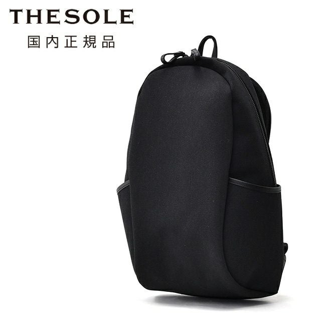 ザソールTHESOLEバックパックメンズPAUL楕円フォルムキャンバス×防水レザーブラック黒内側人工スエードファスナー開閉式国内正規品でらでら公式ブランド