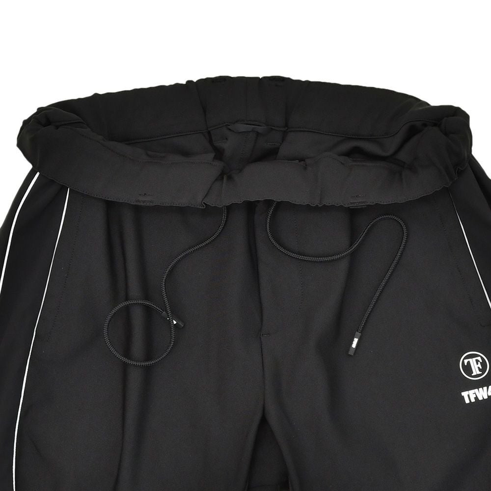 TFW49ティーエフダブリューフォーティーナイントラックパンツメンズジャージーパンツブラック黒配色パターン異素材切り替え2WAYキックバックUVカット吸水速乾多機能国内正規品でらでら公式ブランド