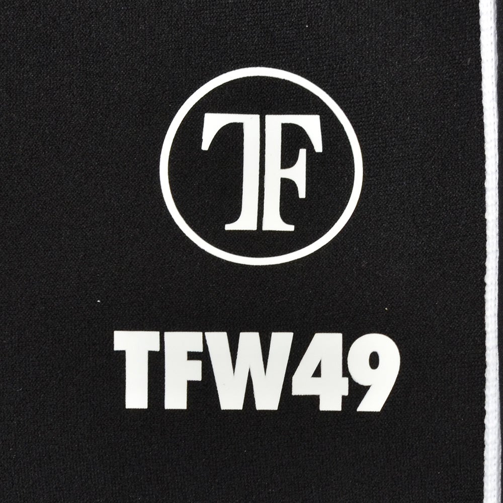 TFW49ティーエフダブリューフォーティーナイントラックパンツメンズジャージーパンツブラック黒配色パターン異素材切り替え2WAYキックバックUVカット吸水速乾多機能国内正規品でらでら公式ブランド