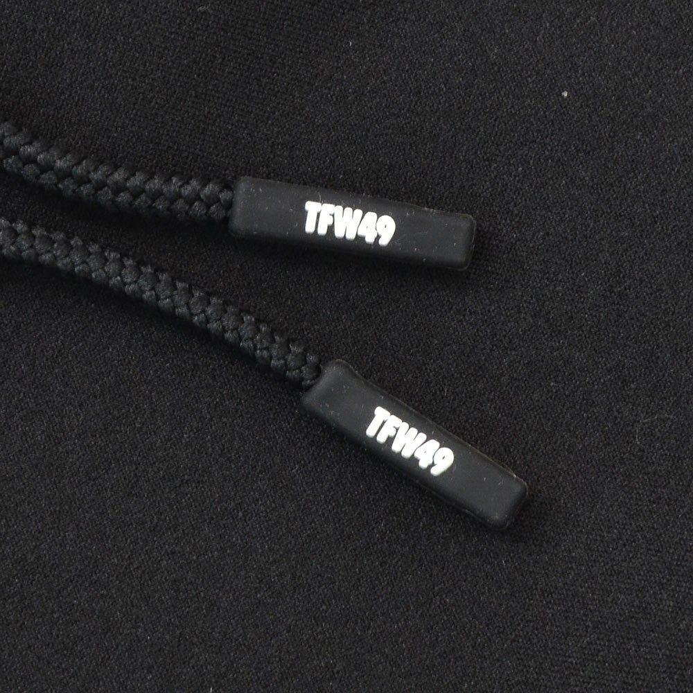 TFW49ティーエフダブリューフォーティーナイントラックパンツメンズジャージーパンツブラック黒配色パターン異素材切り替え2WAYキックバックUVカット吸水速乾多機能国内正規品でらでら公式ブランド