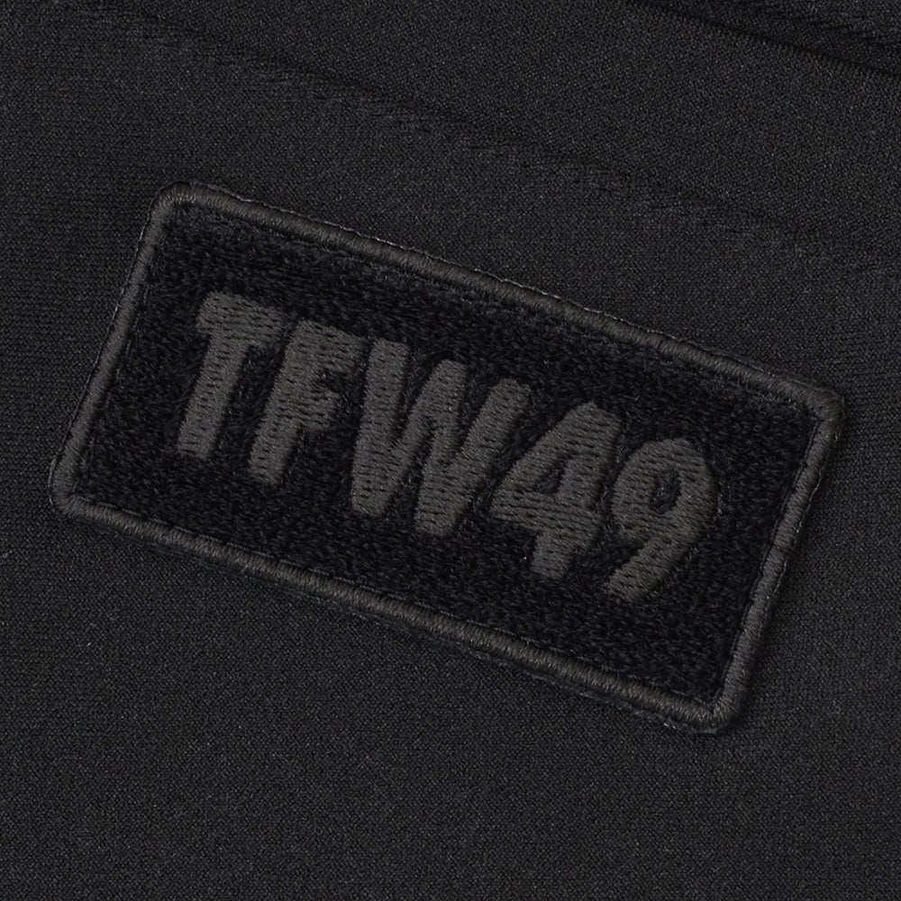 TFW49ティーエフダブリューフォーティーナイントラックパンツメンズジャージーパンツブラック黒配色パターン異素材切り替え2WAYキックバックUVカット吸水速乾多機能国内正規品でらでら公式ブランド